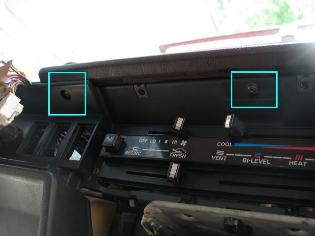 Screws located above climate controls