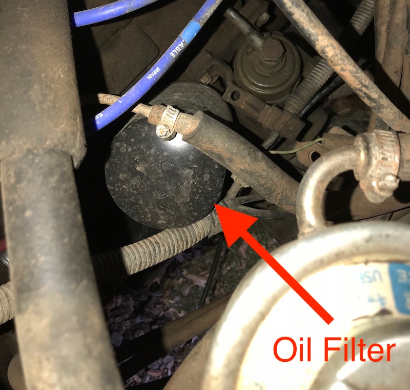 Oil filter access from above