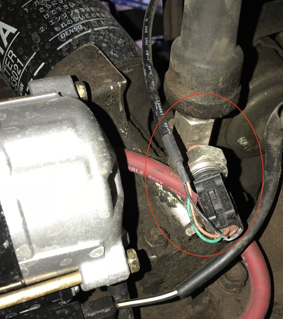 Oil pressure sensor plug tap location